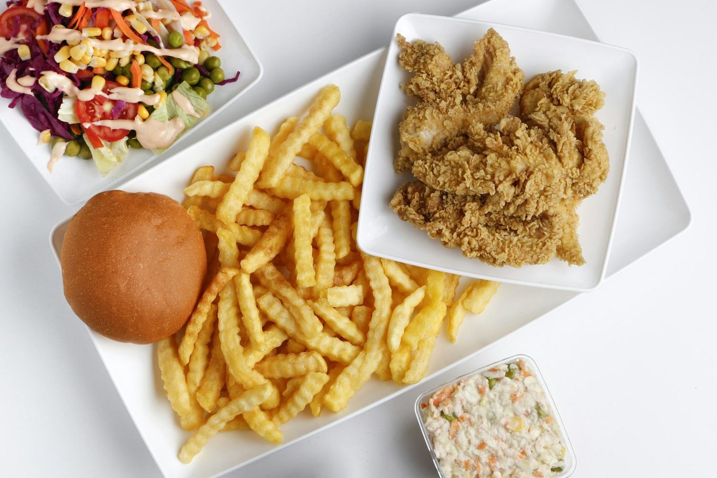 Fried chicken tenders, fries and burger box deal